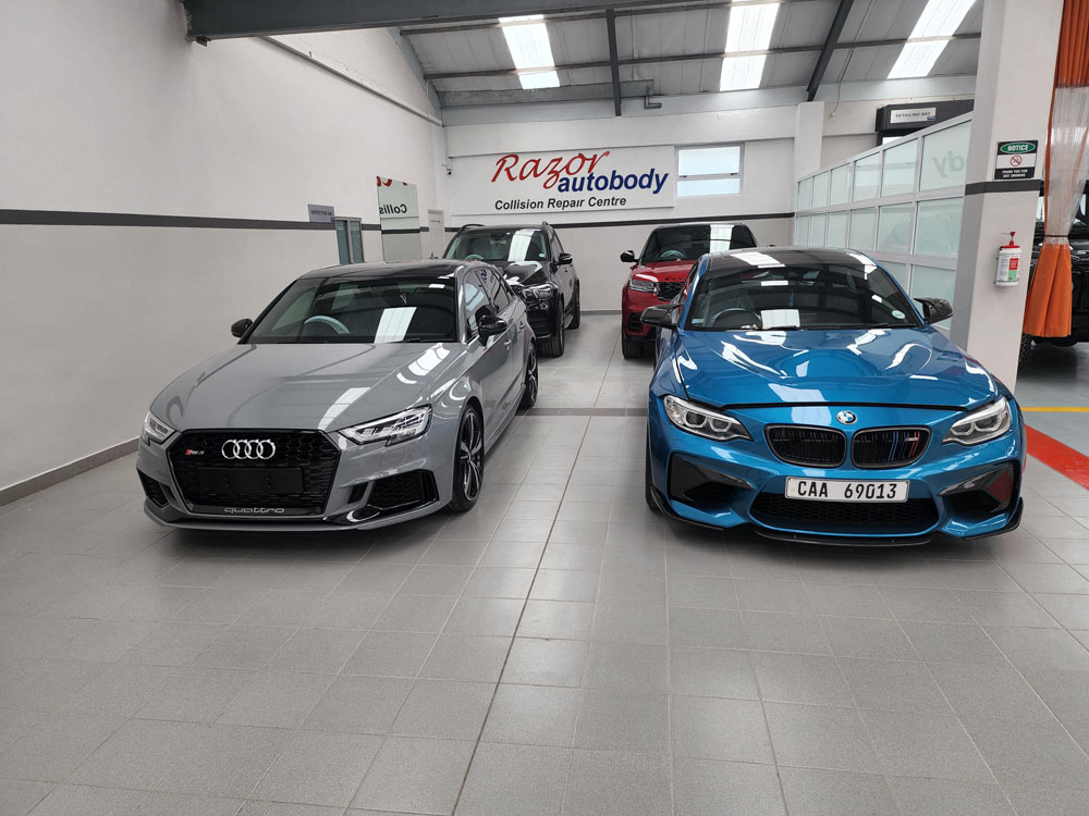 Spray painting at Razor Autobody